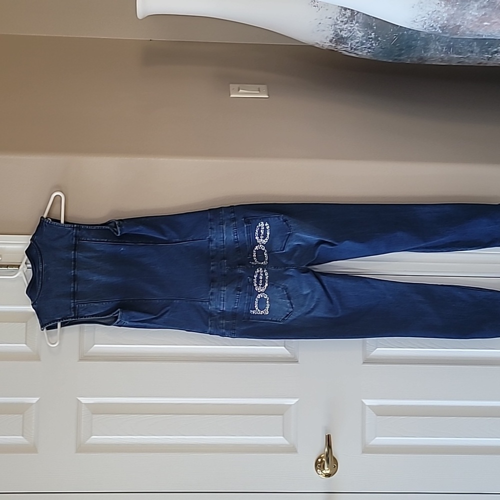 bebe Navy Denim Sleeveless Jumpsuit with Embellished Back Logo